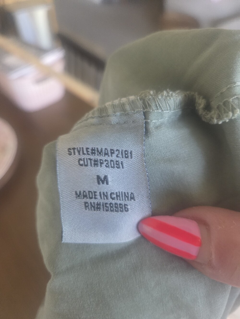 High-Rise Wide-Leg Pleated Pants in Olive - Picture 6 of 10